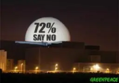 72% of the British public say no to nuclear power and yes to wind. Greenpeace projects poll result onto Sizewell nuclear plant in Suffolk, UK ©Greenpeace